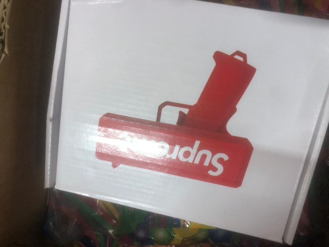 Pistolet à billets amusant rouge