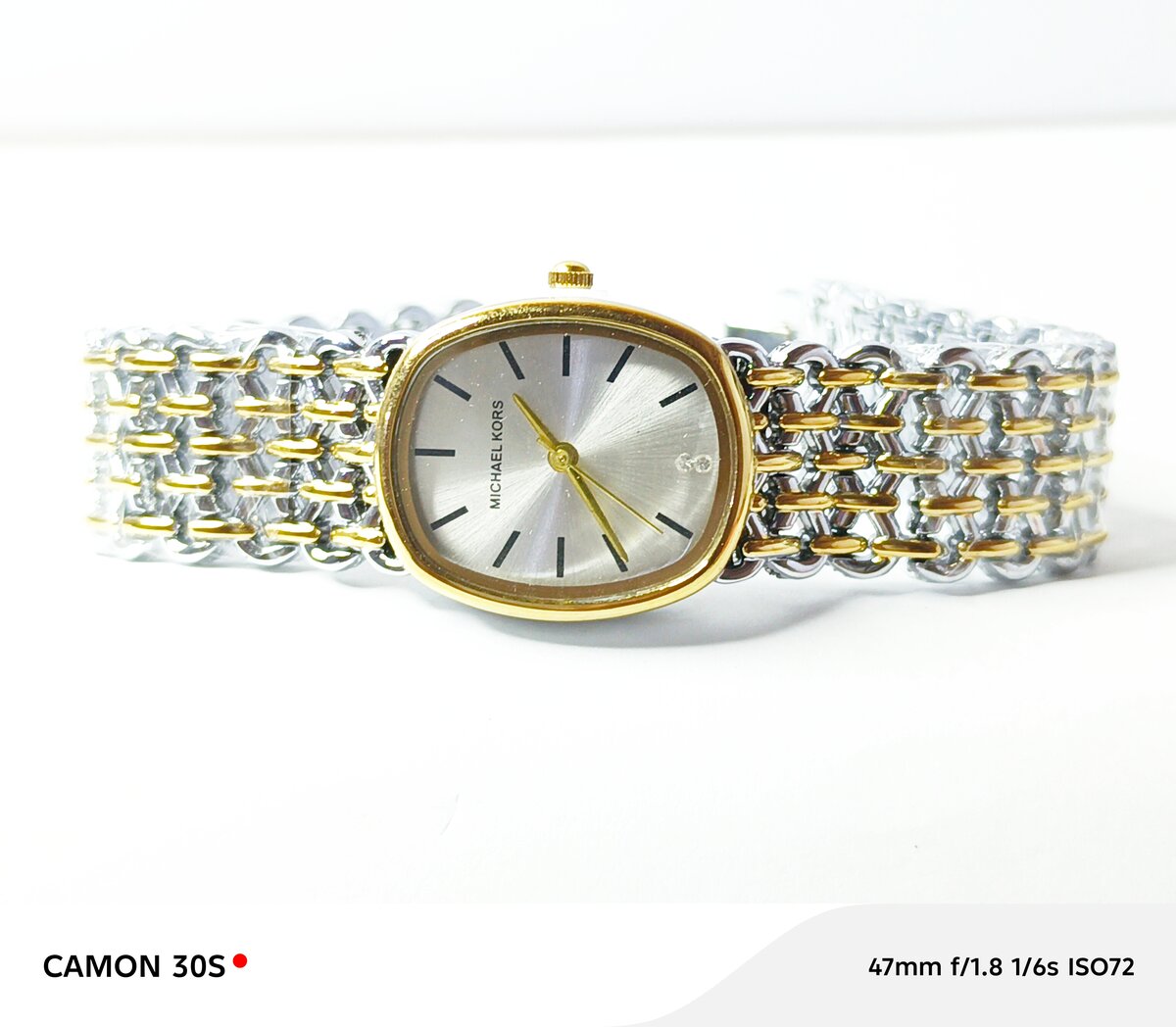 Montre élégante bicolore