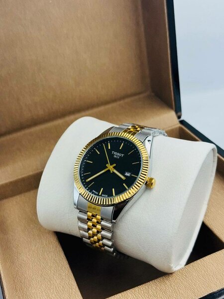 Montre en acier inoxydable dorée