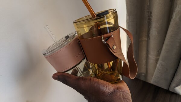 Glass Tumblers with leather handle.