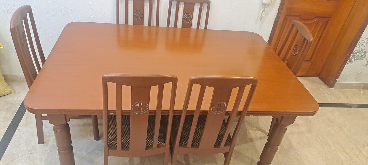 Wooden Dining table with six chairs