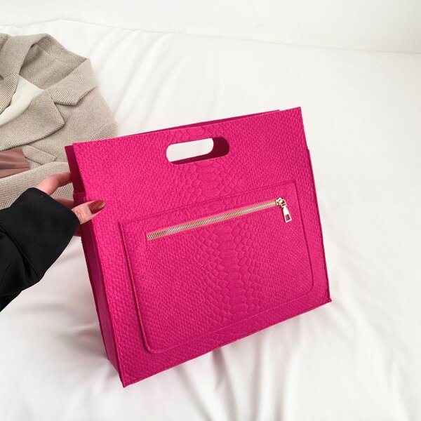 Sacoche en cuir rose vif