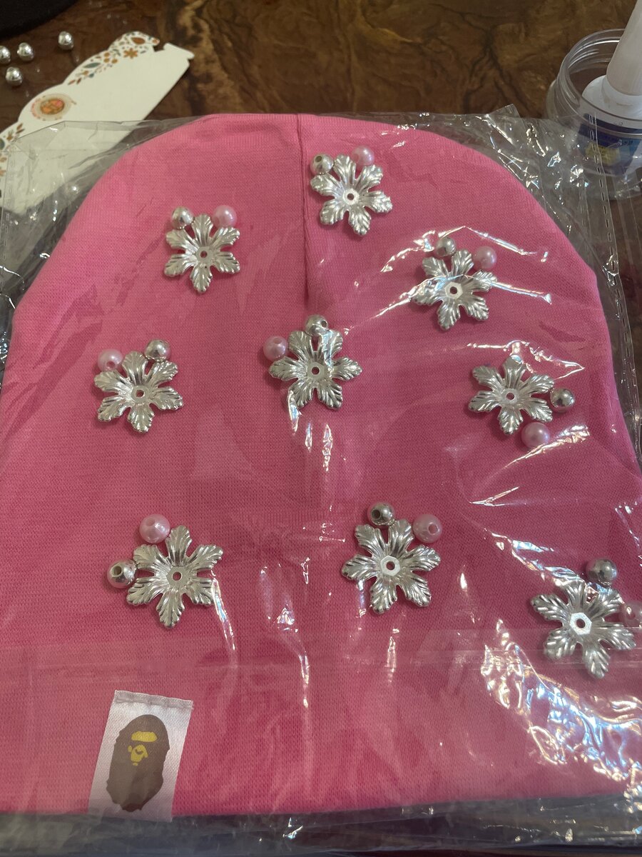 Bonnet fleuri en tricot