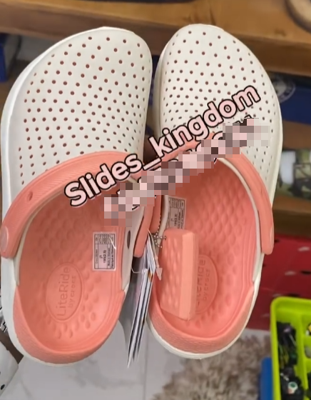 Pink and white crocs