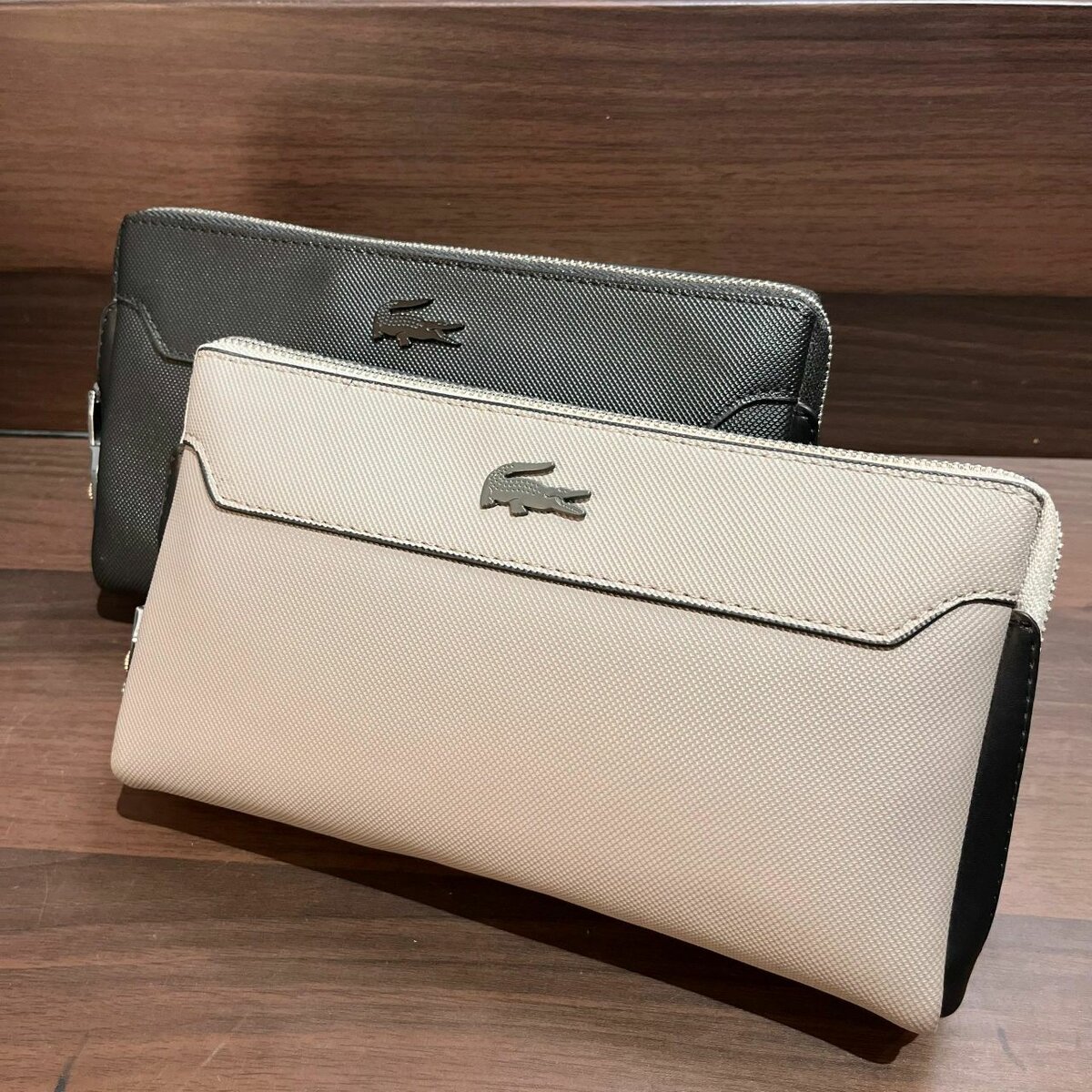 Lacoste leather pouches