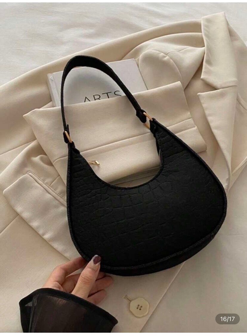 Sac à main croco noir élégant