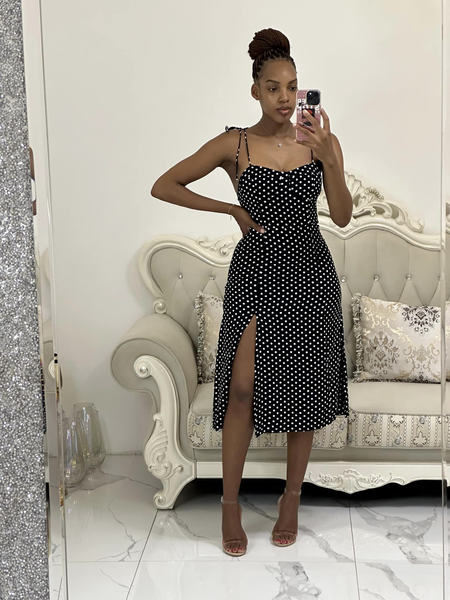 black polka dot sleeveless dress