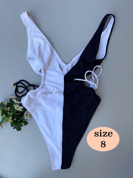 One piece swimwear with side cutout
