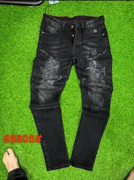 Jeans déchirés tendance homme