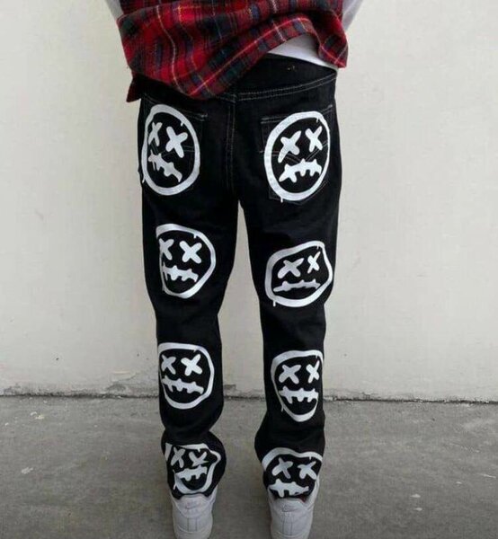 Jeans noirs avec motifs humoristiques