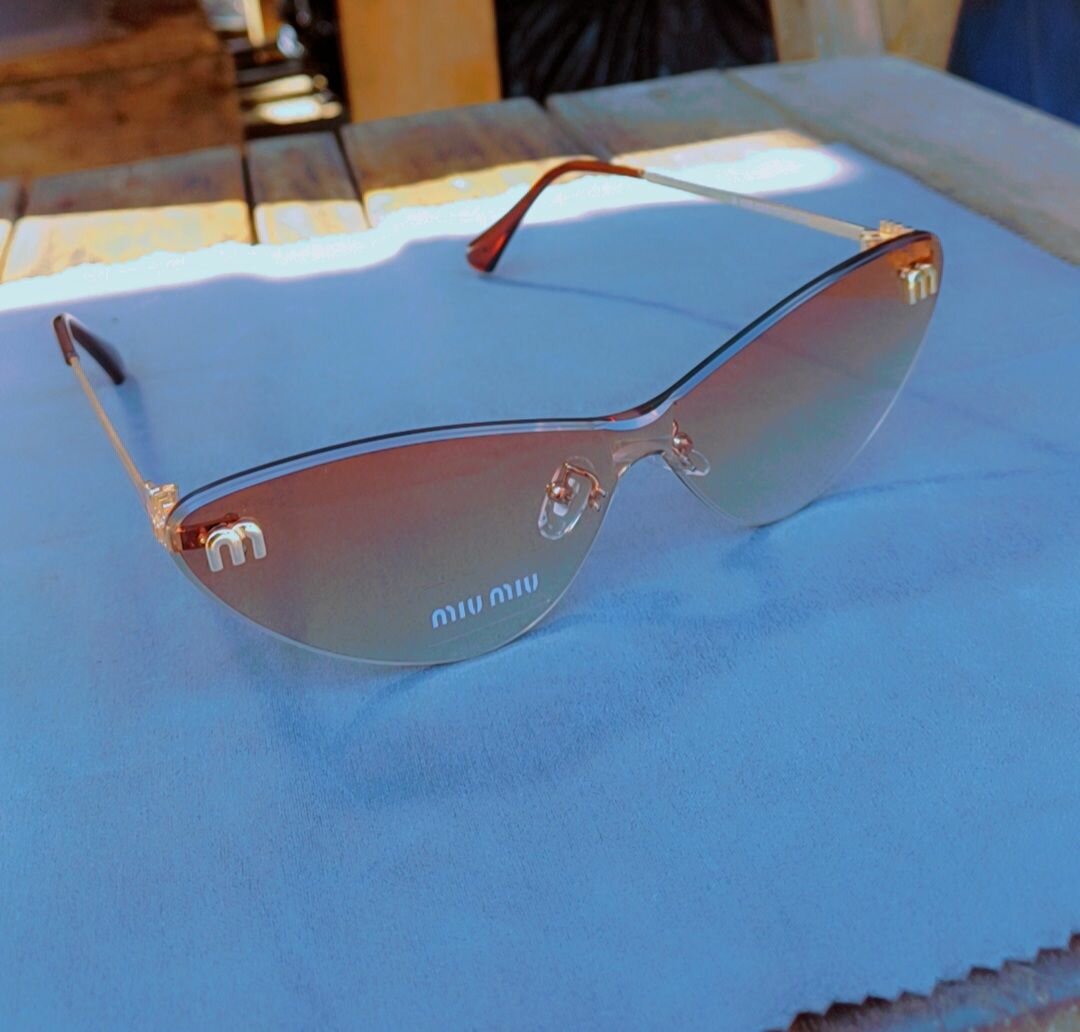 Lunettes de soleil Miu Miu