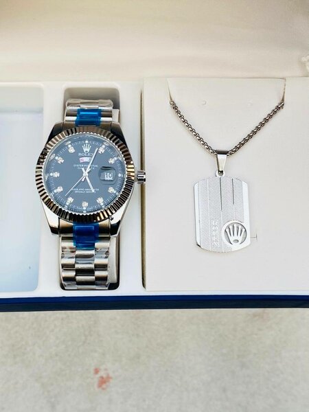 Montre Rolex avec chaîne en acier inoxydable