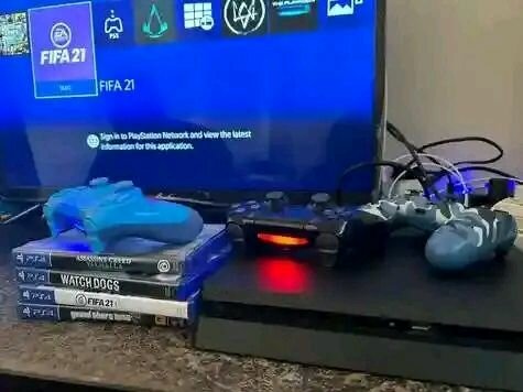 Console PS4 avec jeux et manettes