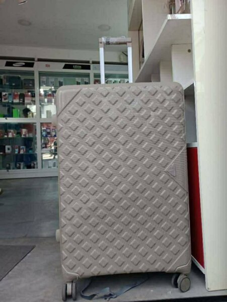 Valise robuste à roulettes