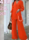 Costume femme avec pantalon palazzo large et chemise boutonnée orange