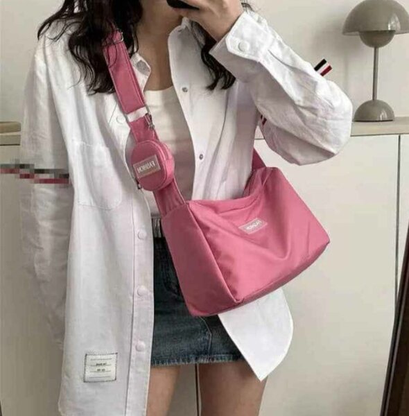 Sac bandoulière rose élégant