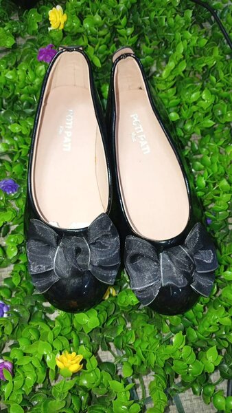 Ballerines noires avec nœud élégant