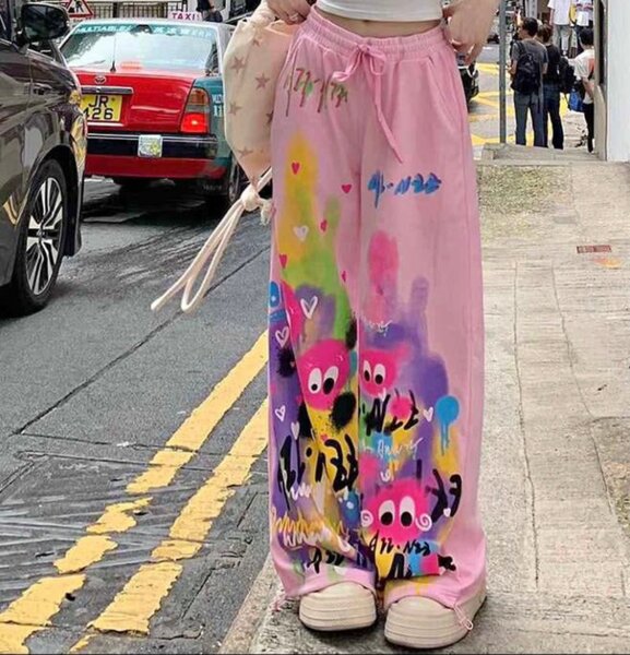 Pantalon large rose graffiti