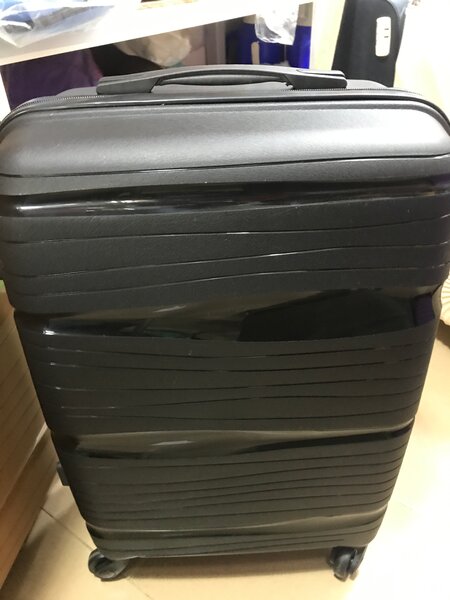Petite Valise gomme à roulette
