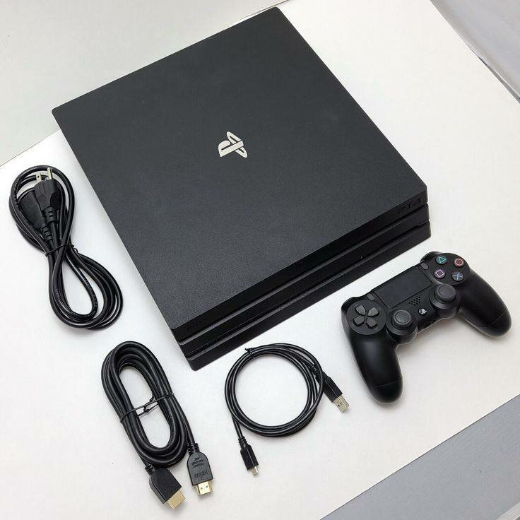 Sony PS4 Slim 1To avec Manette et Jeux - État Impeccable