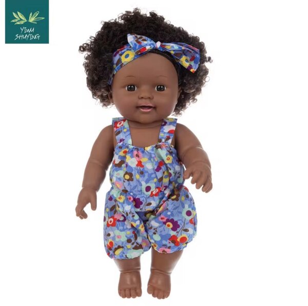 Poupée bébé en tissu coloré