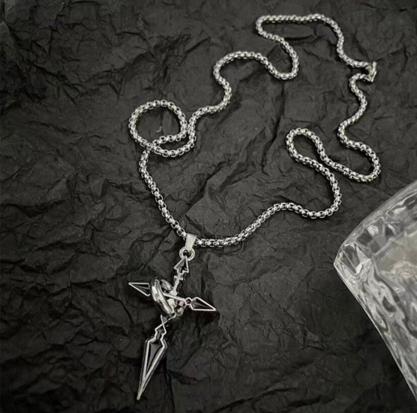 Collier pendentif croix acier