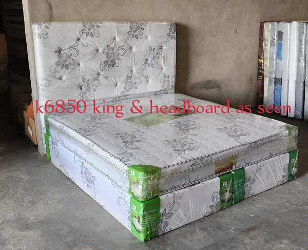 grey bed with flowers