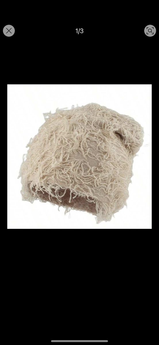 Bonnet chic en laine bouclée