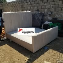 custom made bed with a high base