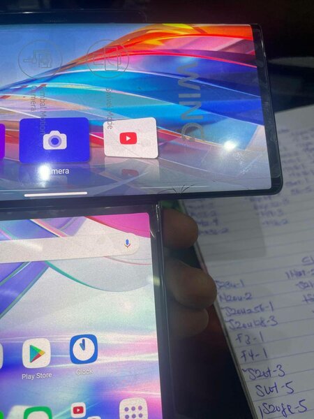 LG Wing 5G 128gb in box small crack down the screen comes wi