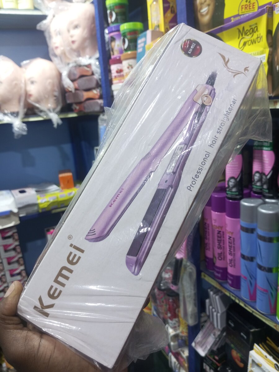 Fer à lisser professionnel Kemei