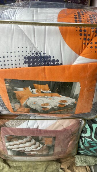Couette  plus draps de lit