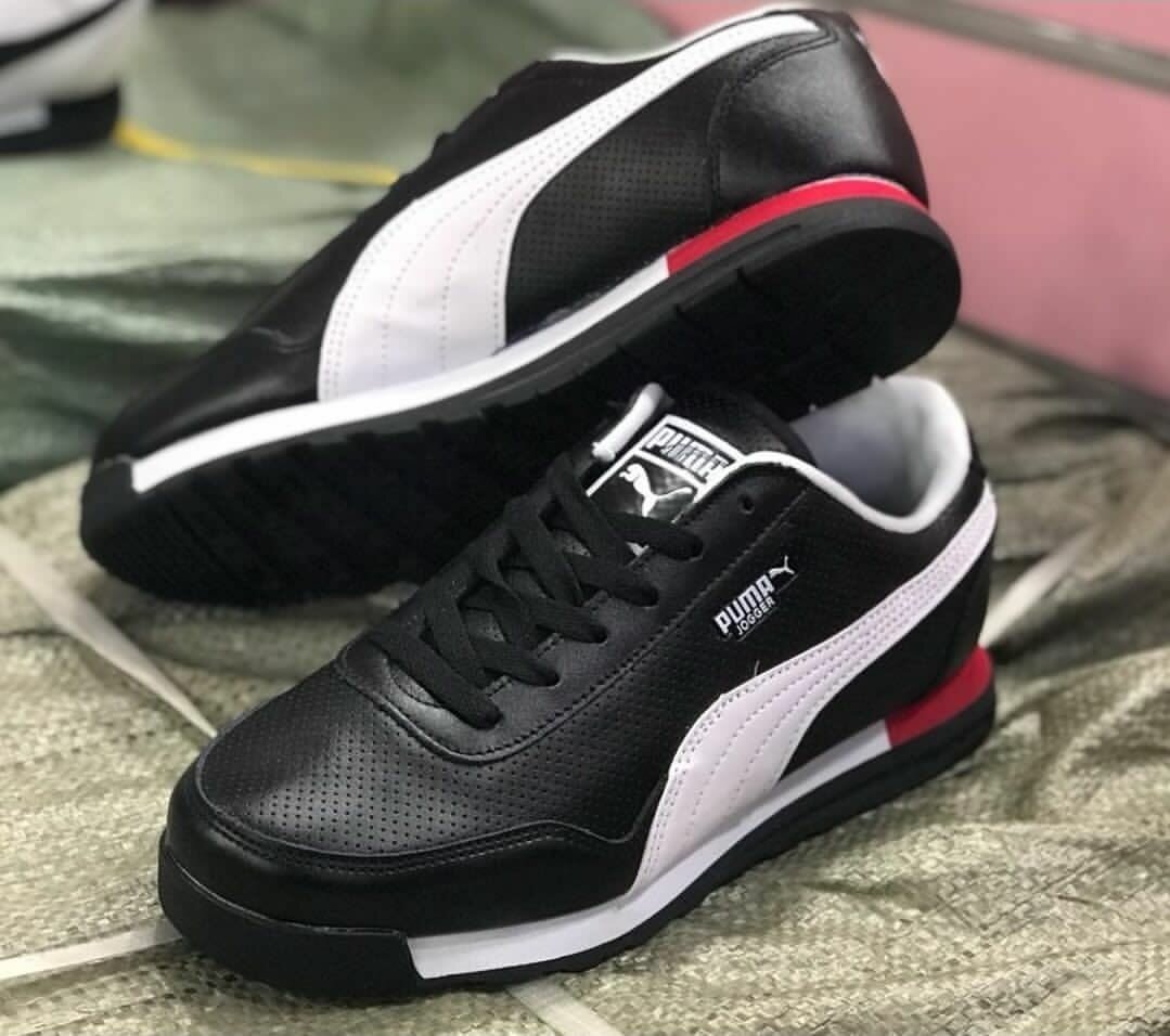 Puma noires en cuir sportive