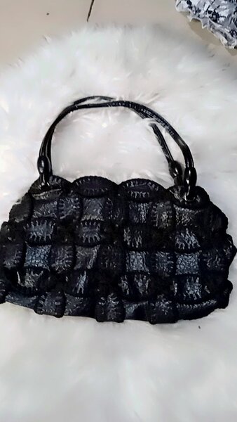 Sac à main en cuir tressé