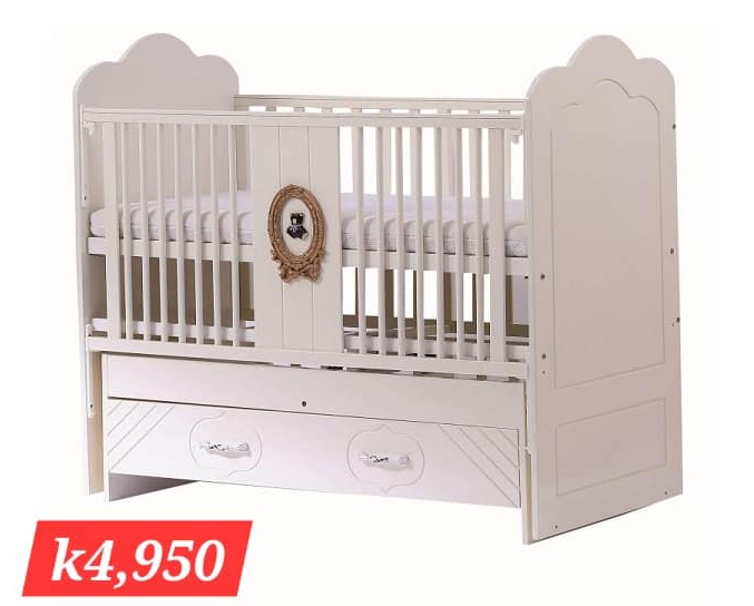 beige wooden crib