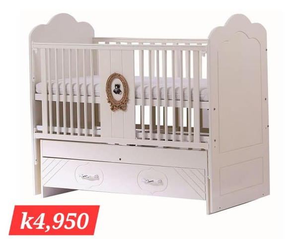 beige wooden crib