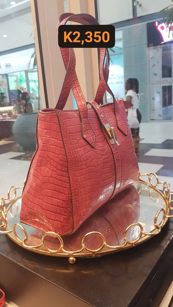 pink leather bag crocodile skin