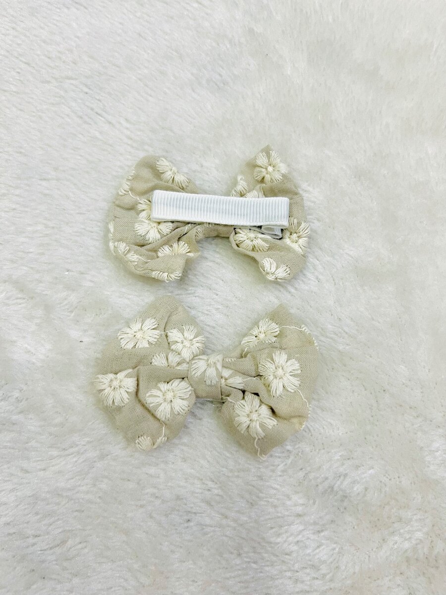 Skin color embroidery hair pins for kids pair.