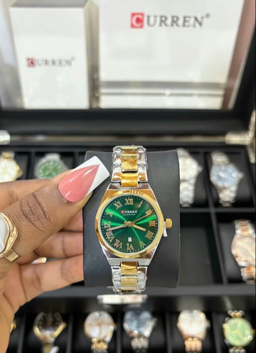 Montre dorée CURREN élégante