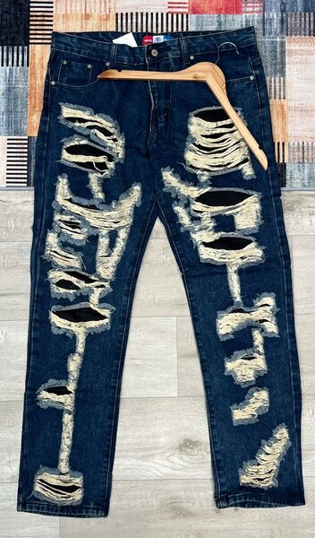 Jean déchiré tendance homme