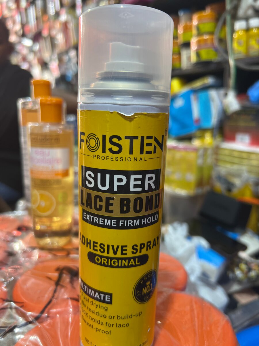 Spray adhésif pour perruque