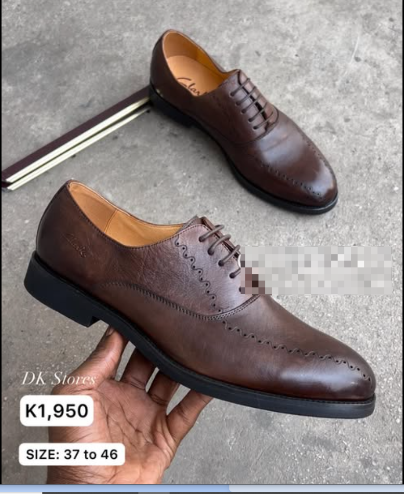 brown lace-up shoes with perforation