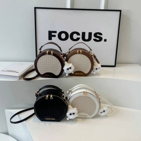 Sac rond en cuir tissé pour femmes