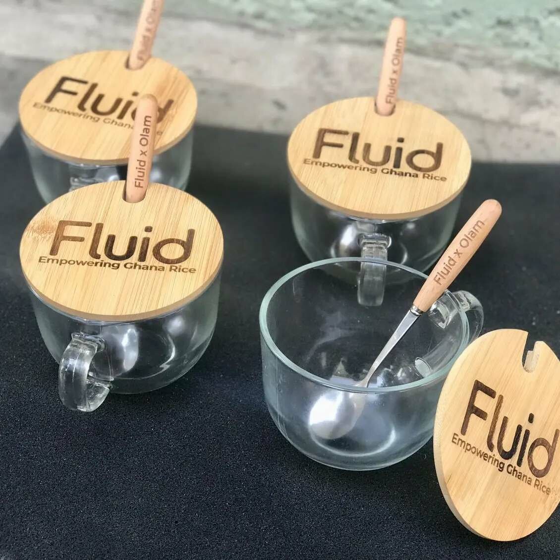 Glass mug with wooden lid and sooon