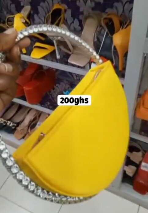 Yellow clutch with large rhinestones