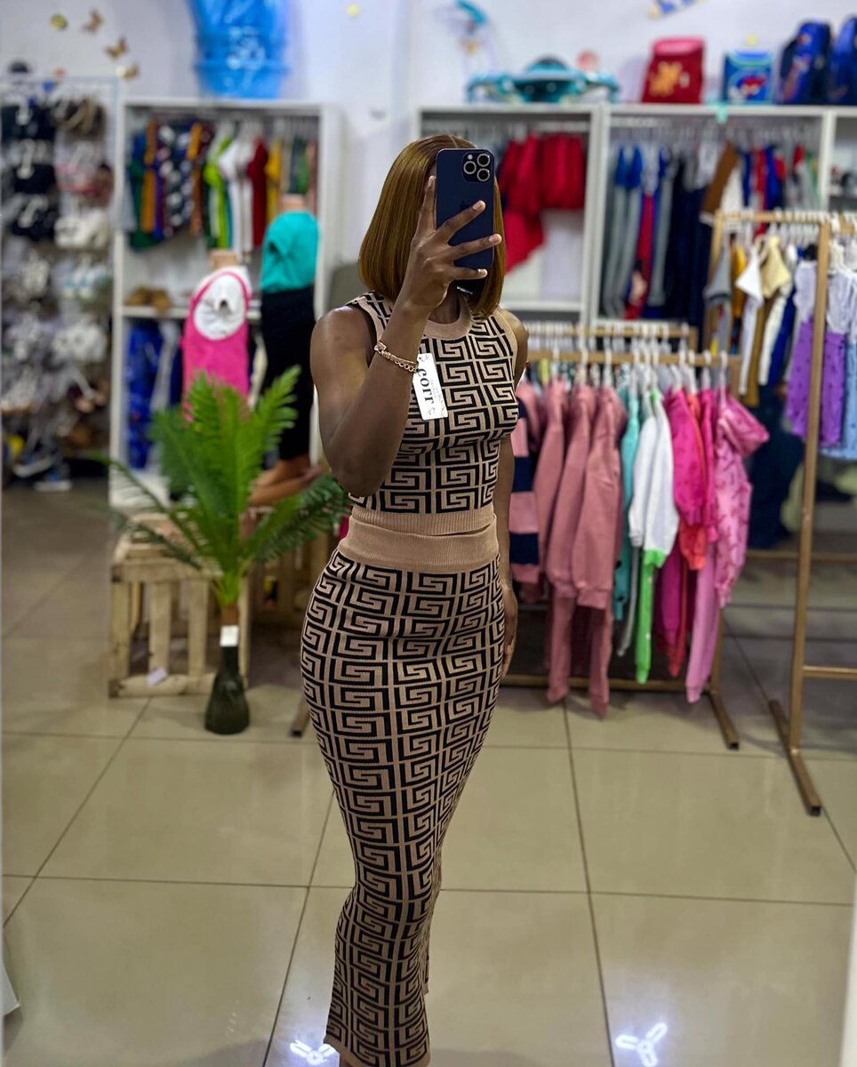 brown long dress with an ornament