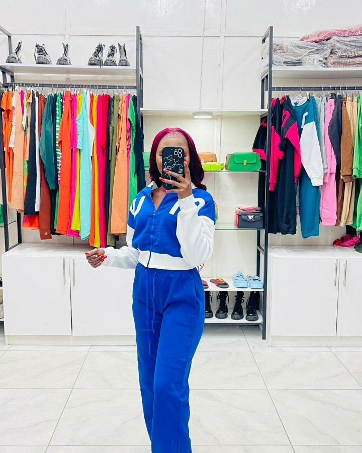 white and blue tracksuit