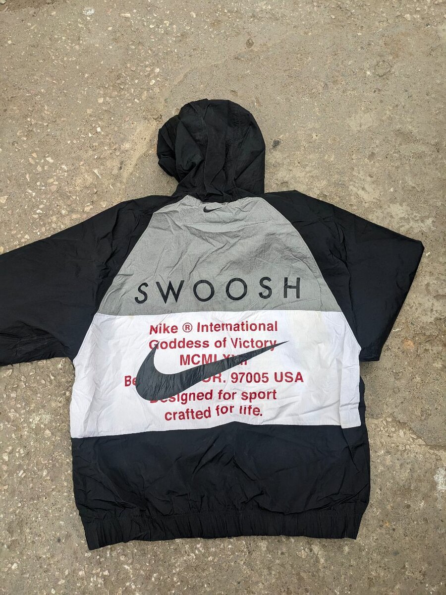 Nike swoosh windbreaker