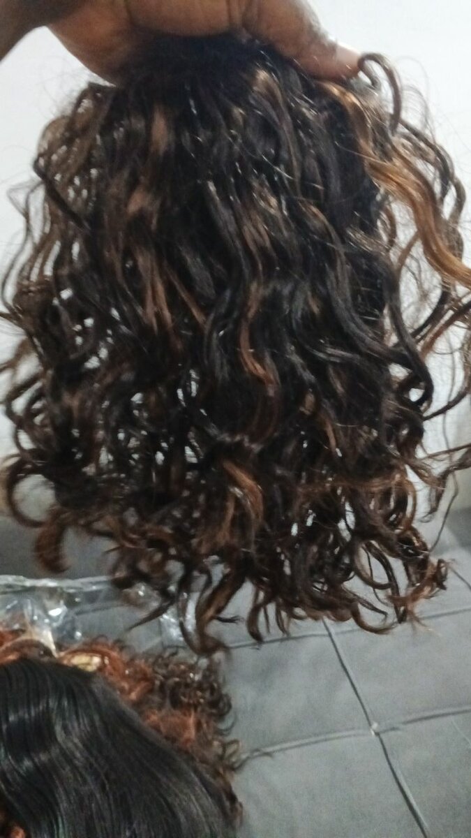 Extensions cheveux bouclés