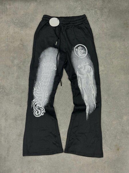 Pantalons noirs à motifs artistiques